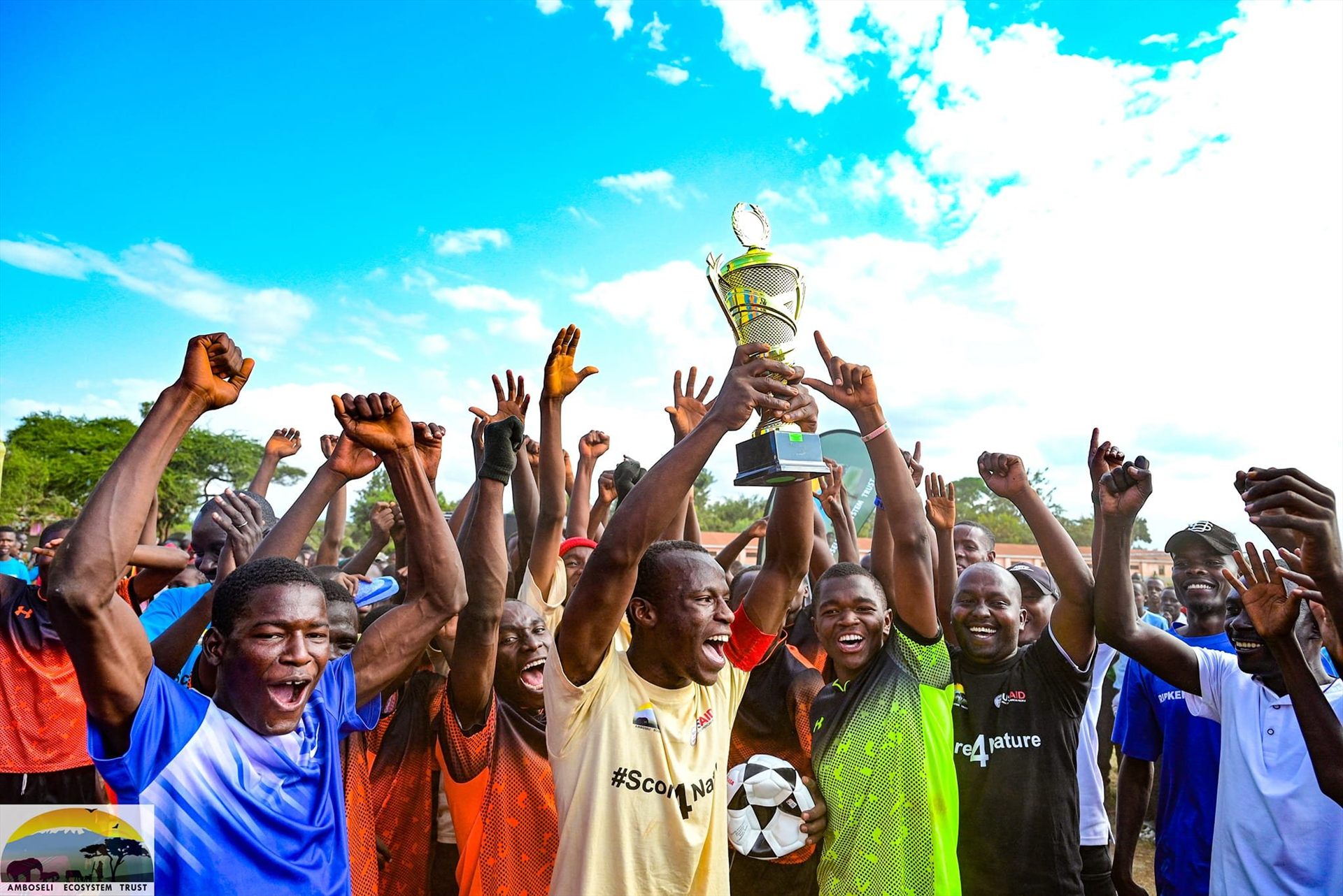 Students and youth celebrating at the annual #Score4Nature tournament